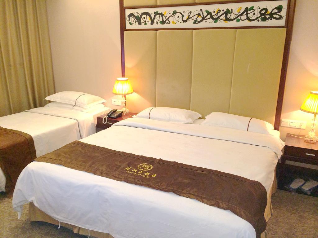 Long Zhou Grand Hotel Guangzhou Værelse billede